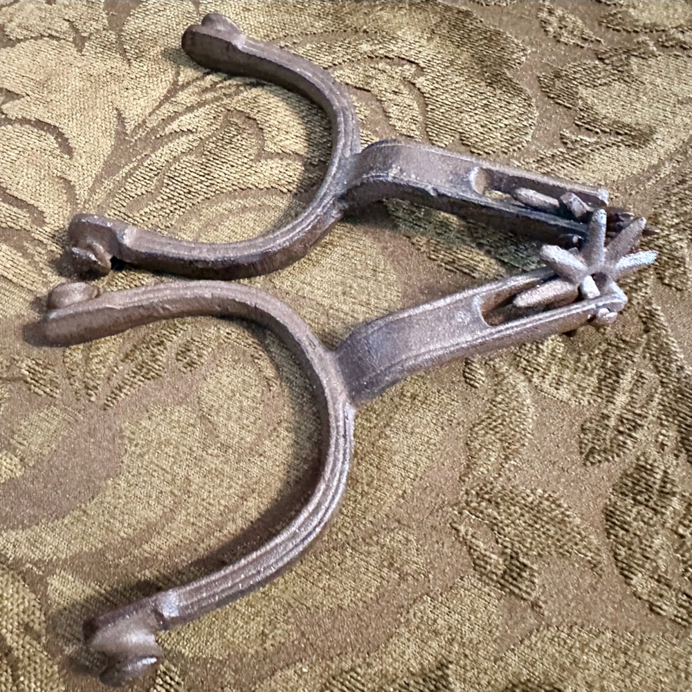 Two Rustic Metal Spurs